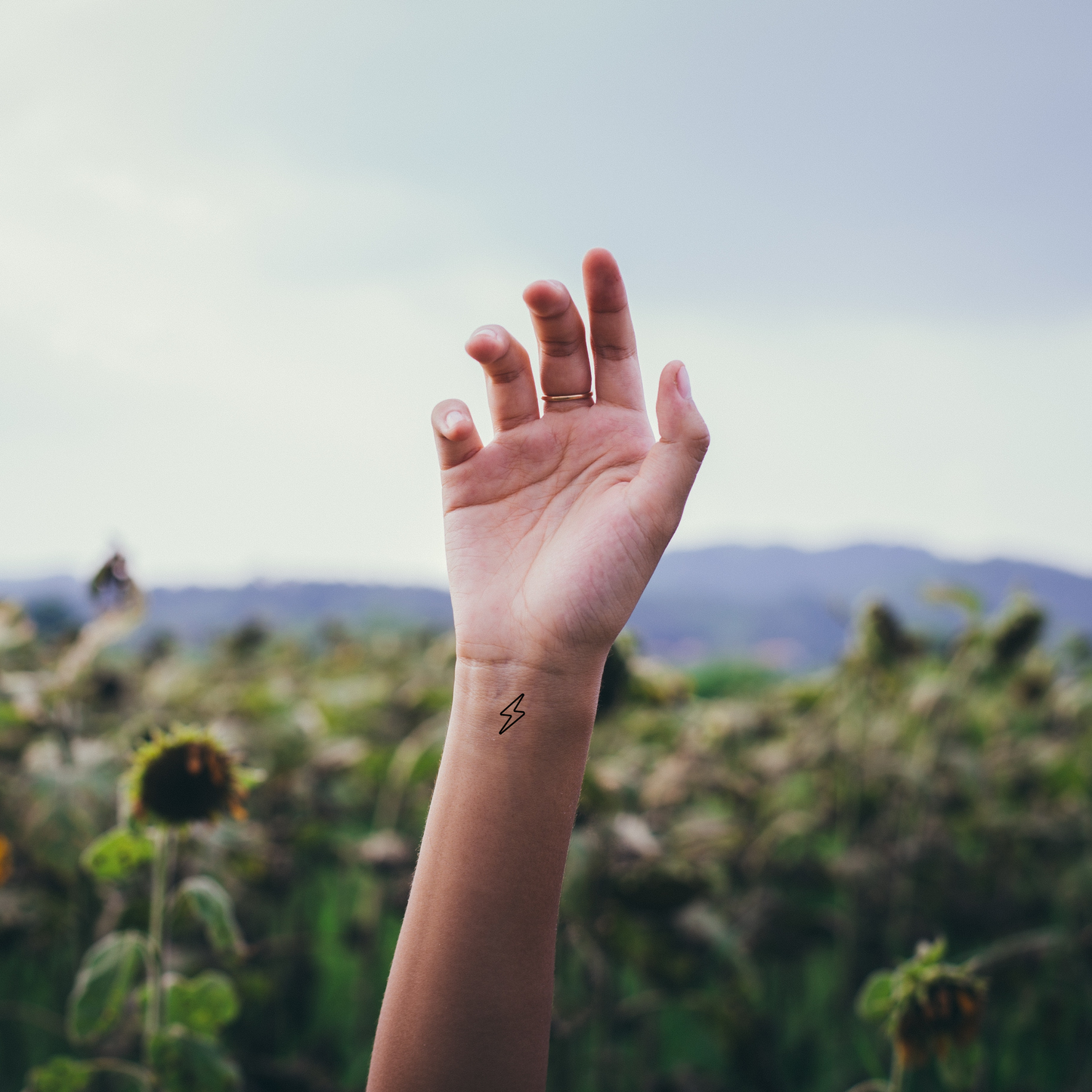 Small icon tattoo