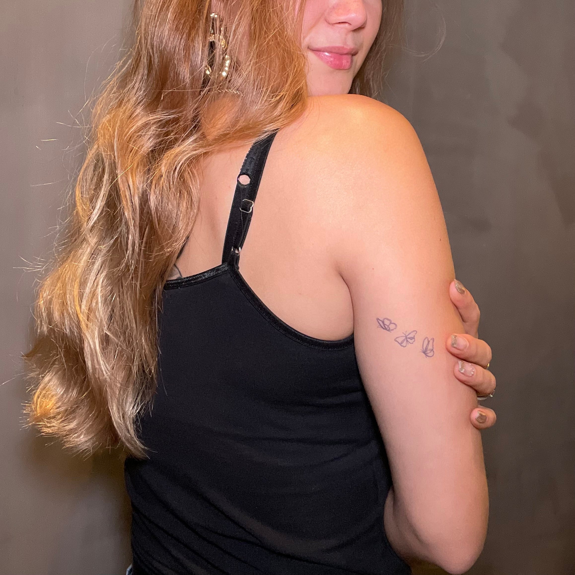 Vlindertatovering: betydning, stiler og inspirasjon for ditt perfekte design