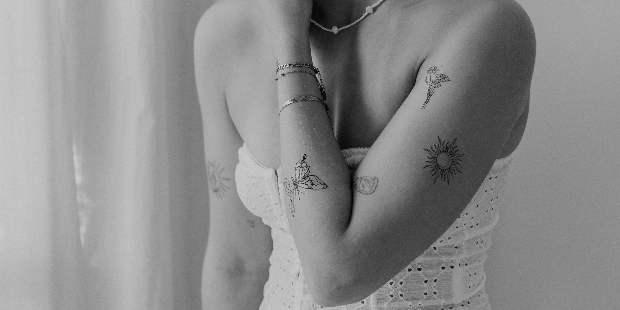 Tatovering av sommerfugl på underarmen: betydning, stiler og inspirasjon