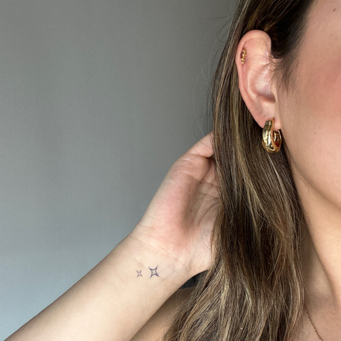Midletidig tatovering glitrende